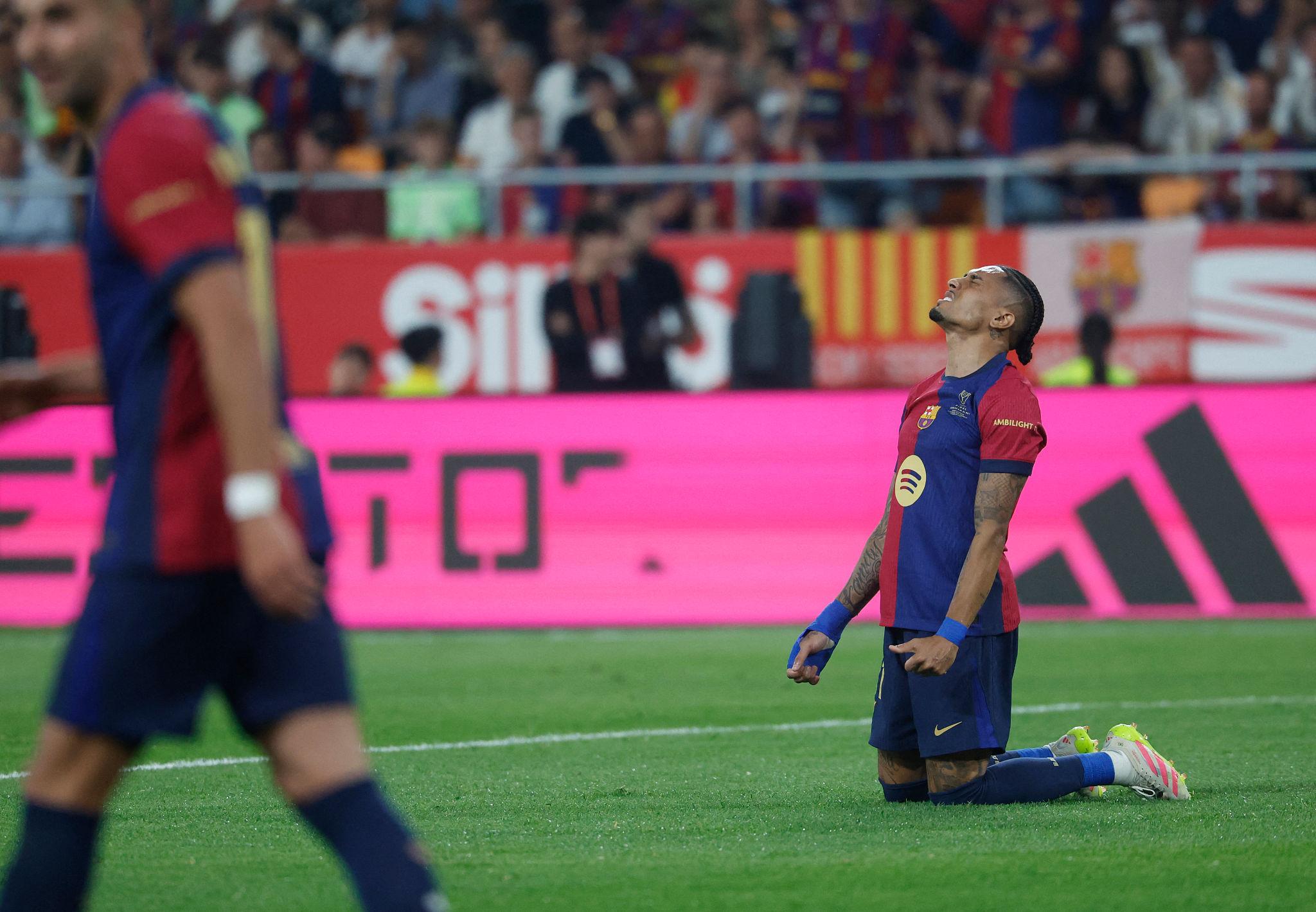 Raphinha playing soccer